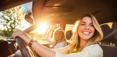 Woman driving in summer 