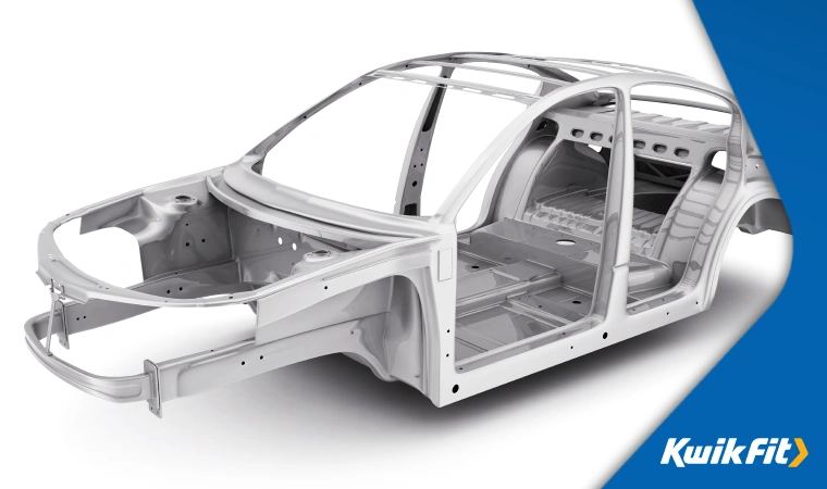 A car frame showing the structural body of a car.