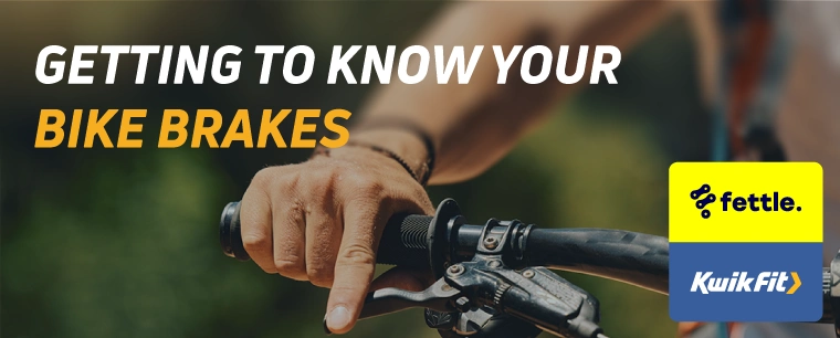 Person applying the brakes to their bike.