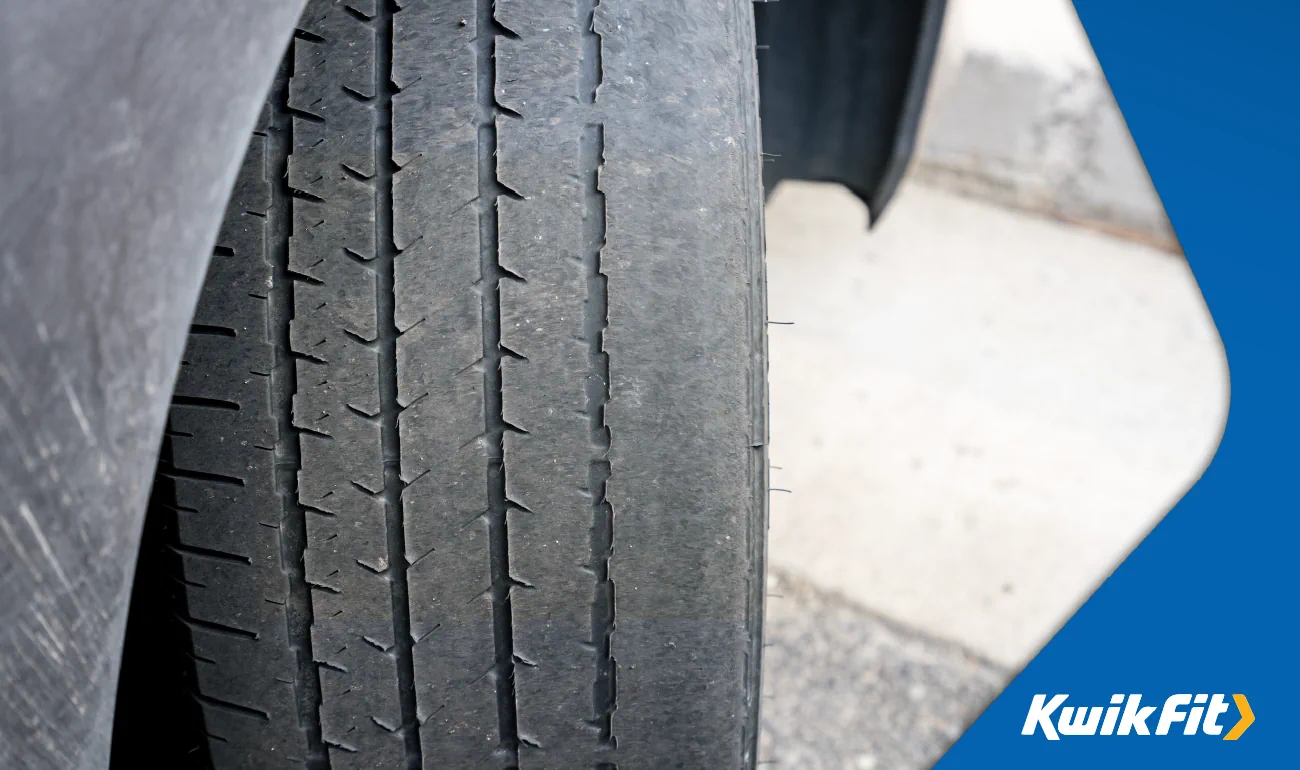 Worn out tyre on a car.