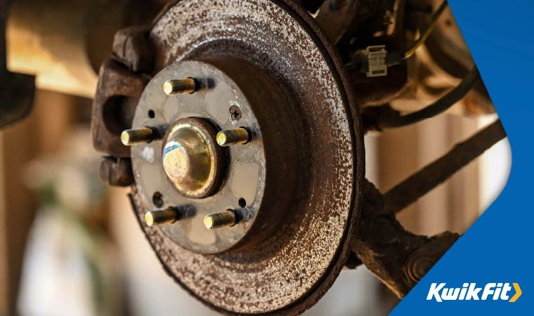 A corroded, rusty brake disc.