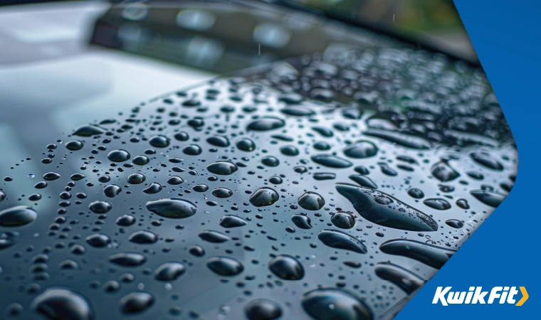 Water on a cars windscreen.