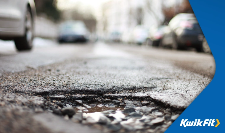 Close up on a road surface showing an early stage pothole  unlikely to cause much damage at this stage but likely to get worse quickly without attention.